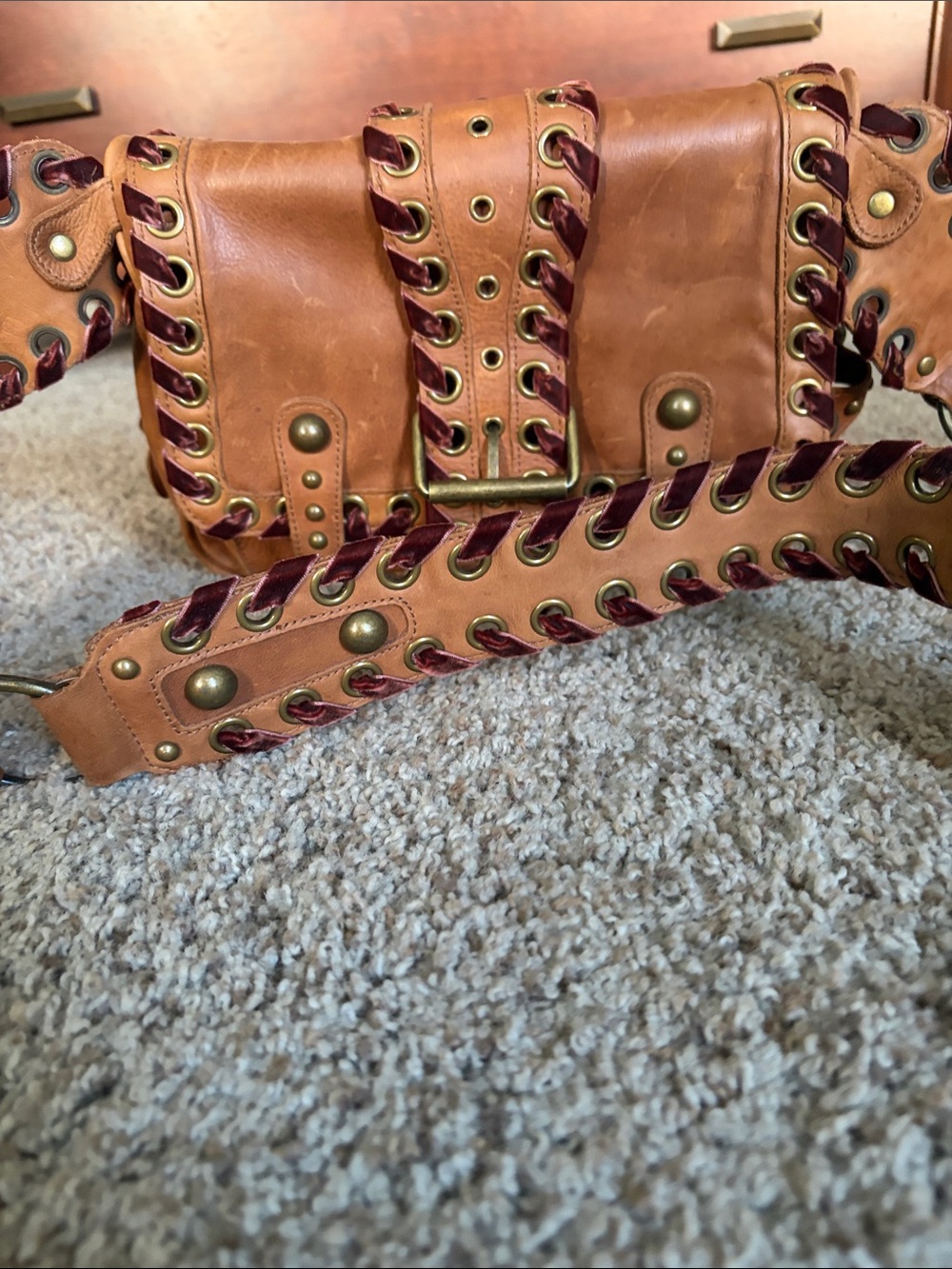 Betsey Johnson Tan and Burgundy Leather Shoulder Bag with Grommet Detail